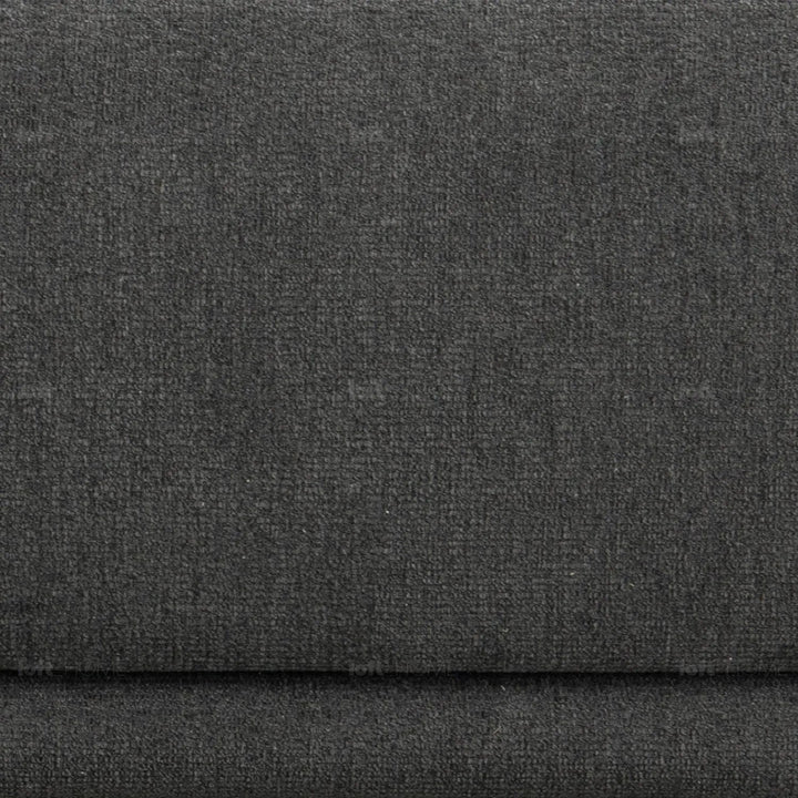 Modern mixed weave fabric 2 seater sofa oble in panoramic view.