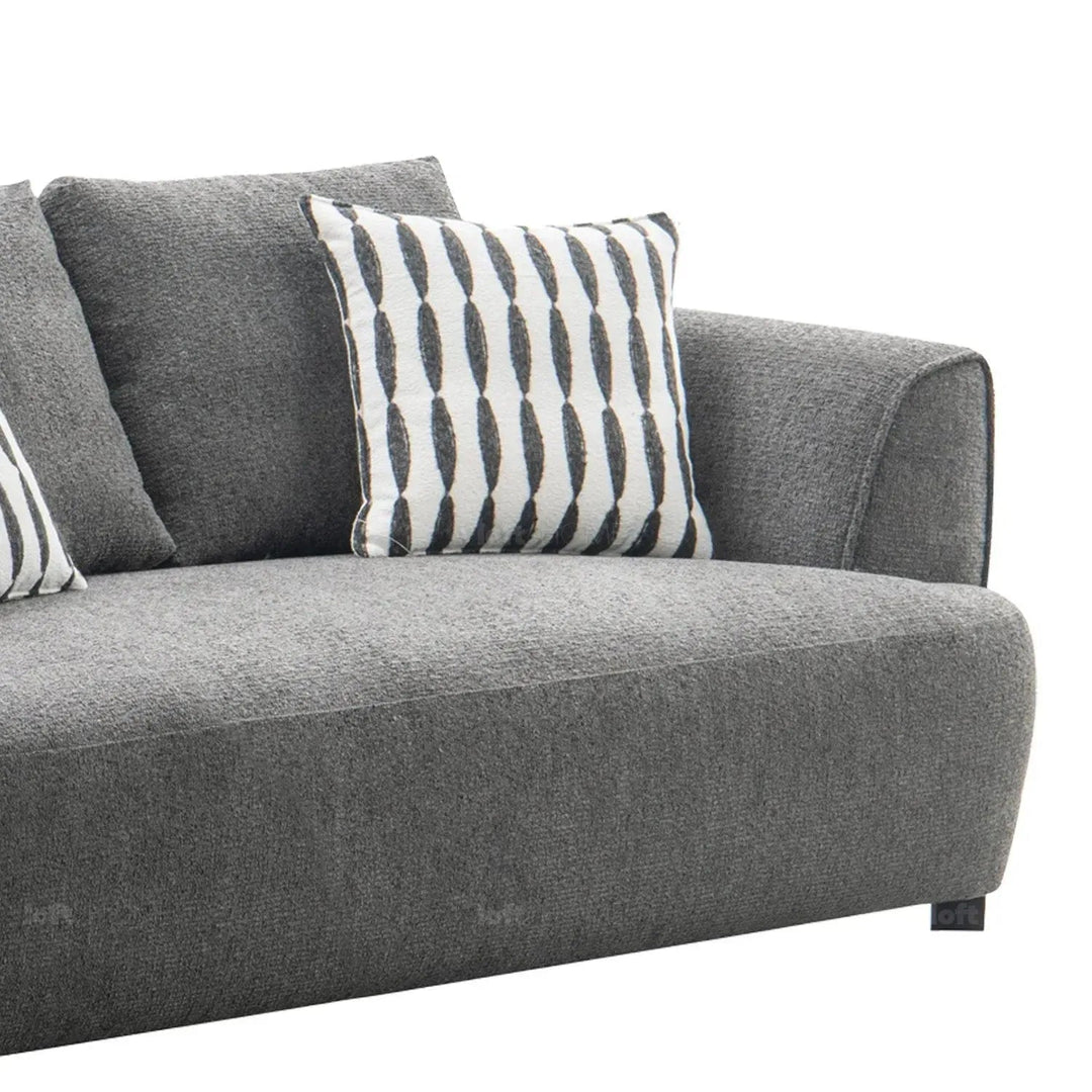 Modern mixed weave fabric 2 seater sofa oble with context.