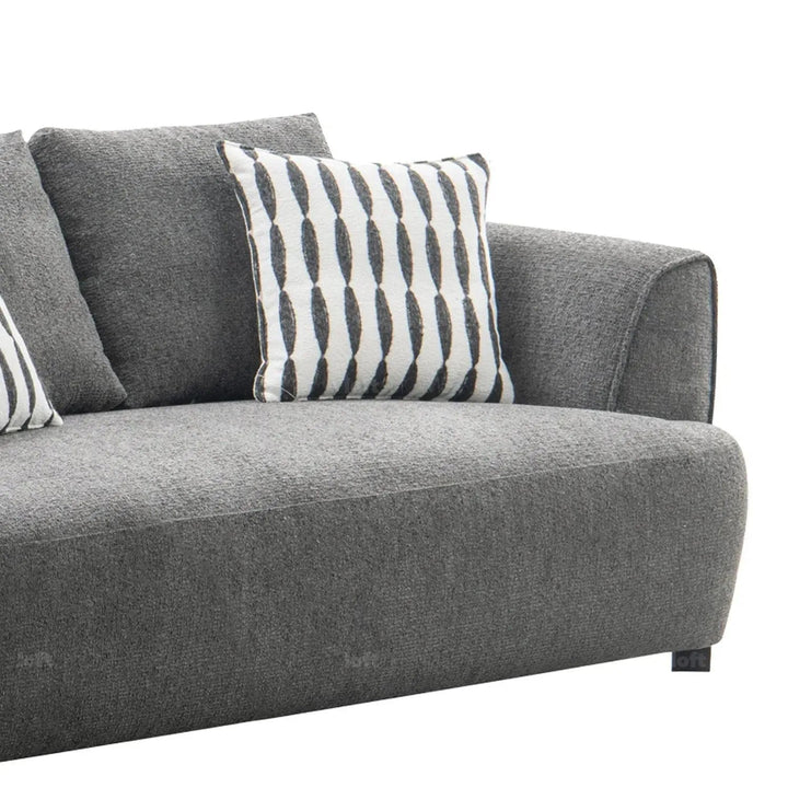 Modern mixed weave fabric 2 seater sofa oble with context.