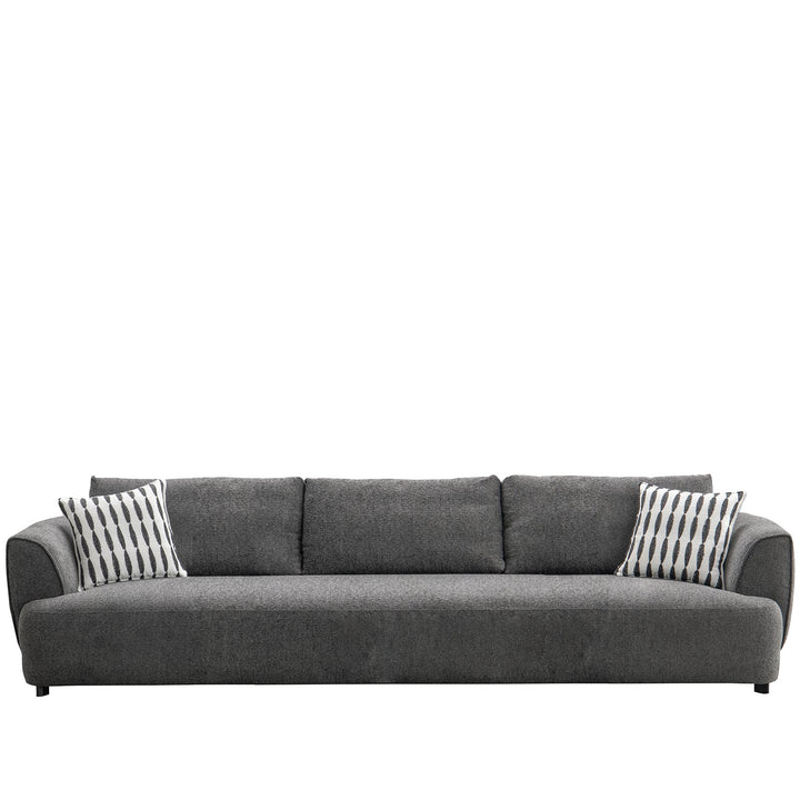 Modern mixed weave fabric 3 seater sofa oble in still life.