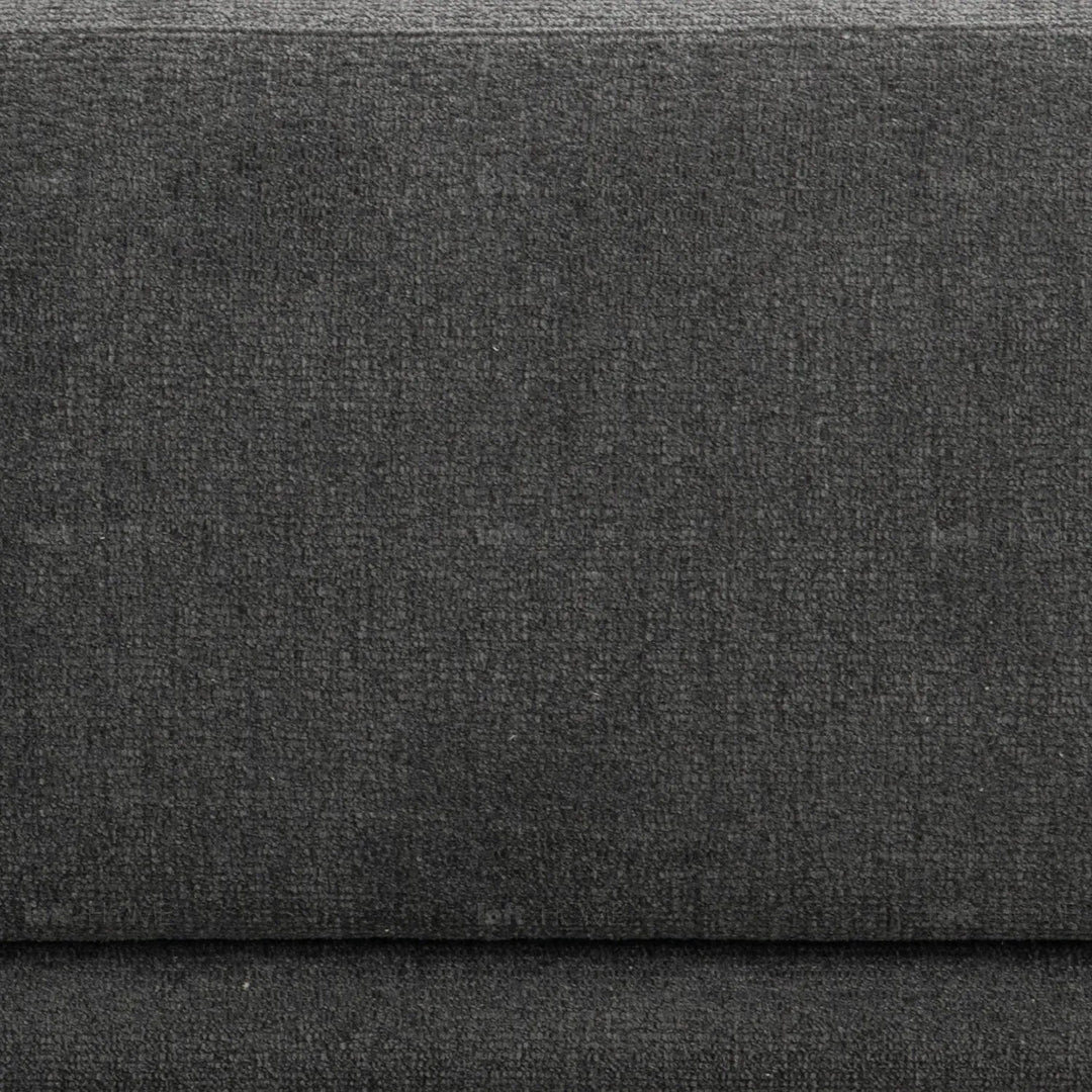 Modern mixed weave fabric 3 seater sofa oble in panoramic view.