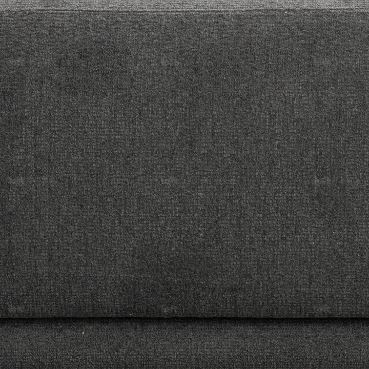 Modern mixed weave fabric 3 seater sofa oble in panoramic view.