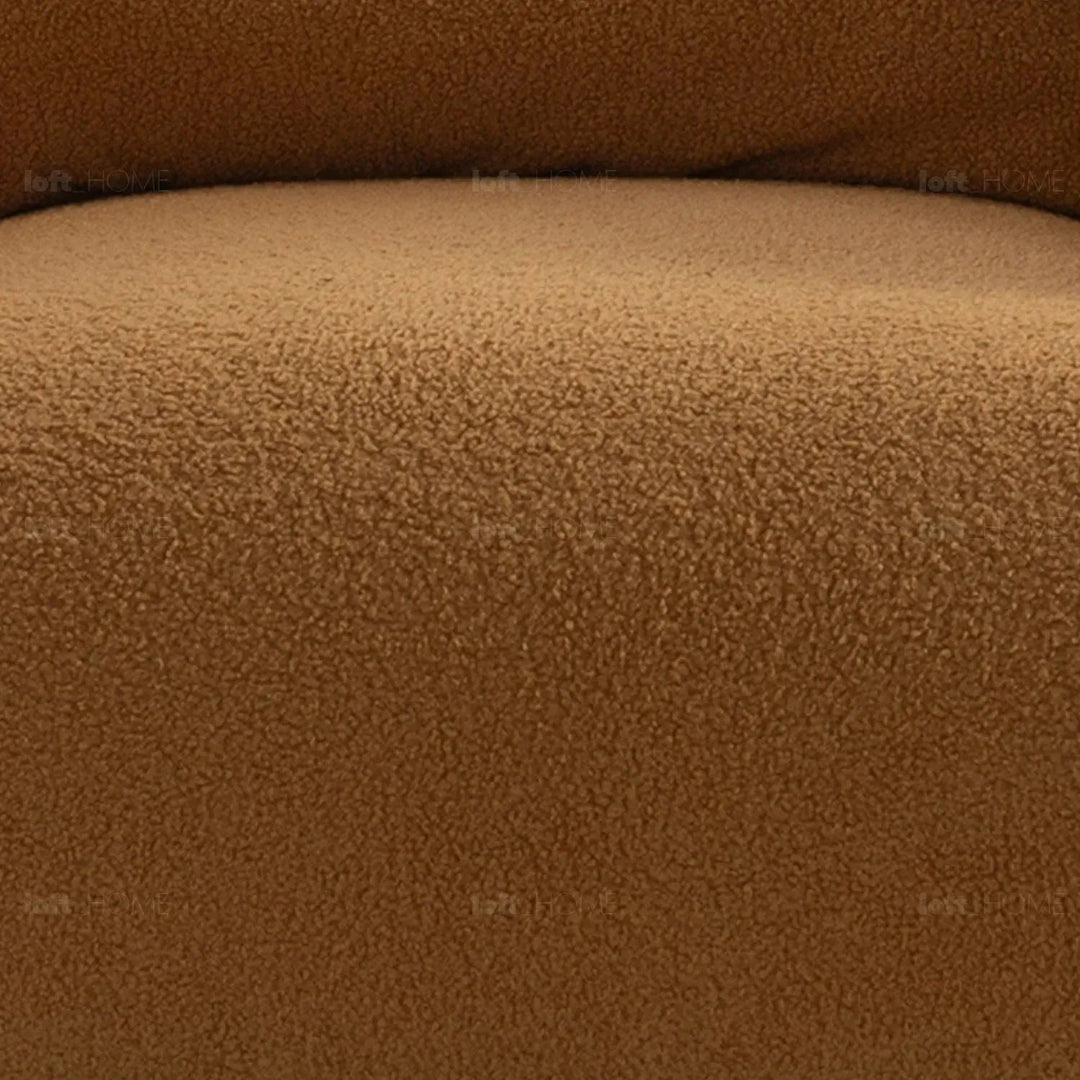 Modern sherpa fabric 1 seater sofa saffron in panoramic view.