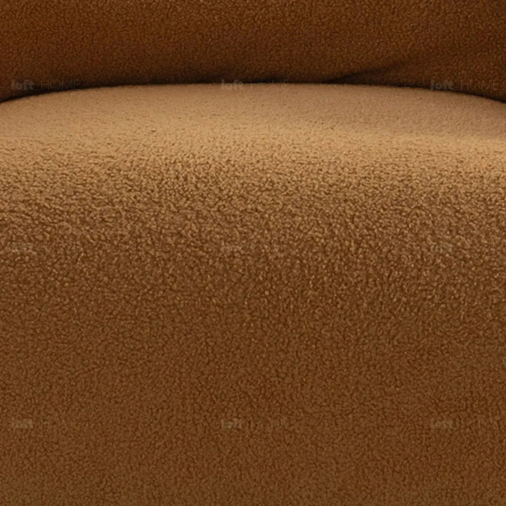 Modern sherpa fabric 1 seater sofa saffron in panoramic view.