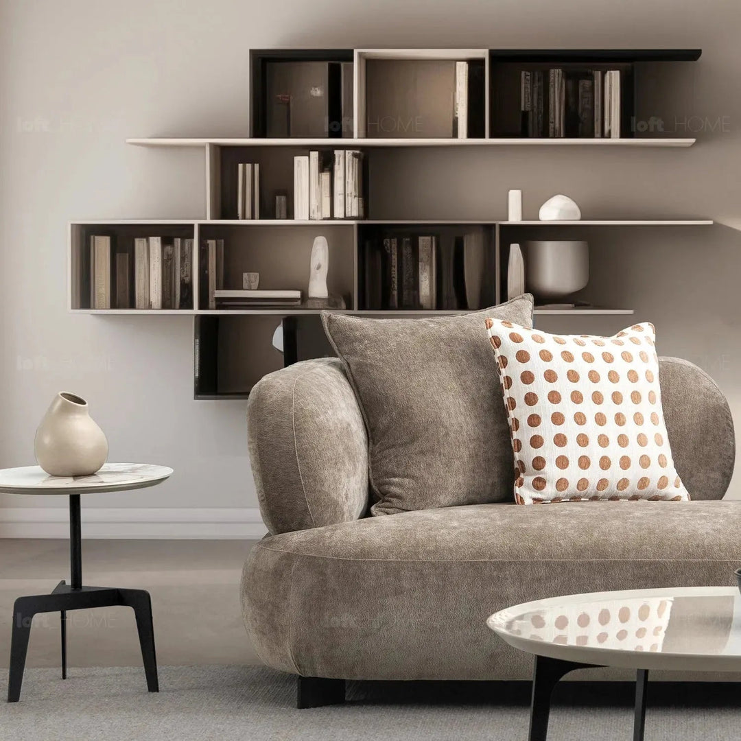 Cream sherpa fabric 2 seater sofa calyx in close up details.