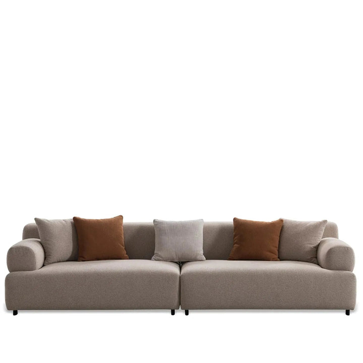 Minimalist sherpa fabric 4 seater sofa noble in white background.