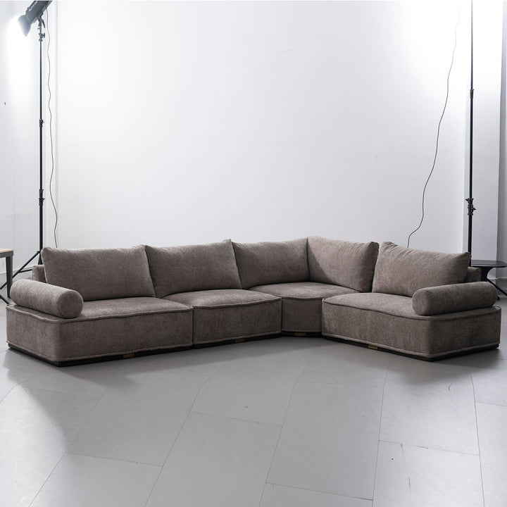 Minimalist corduroy velvet fabric modular l shape sectional sofa 4+l cordy in panoramic view.
