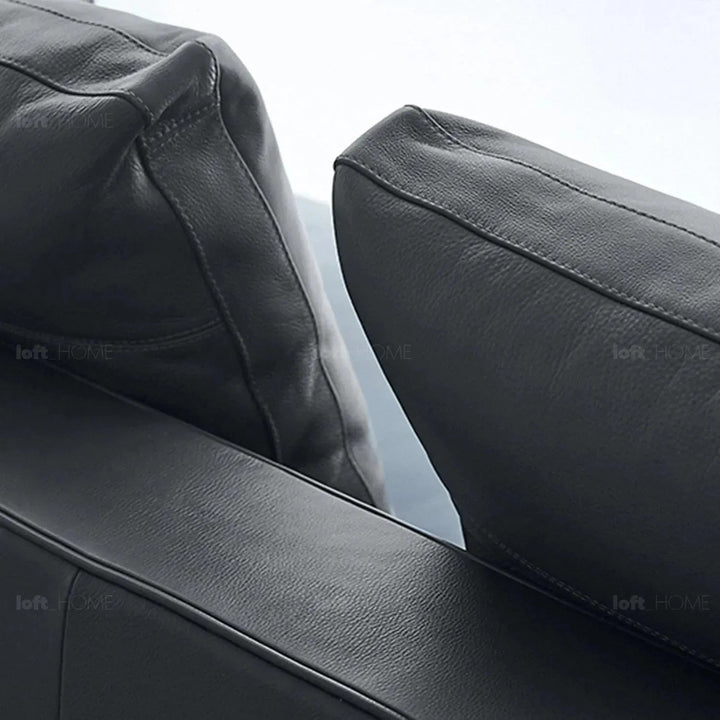 Minimalist fabric 2 seater sofa como in still life.