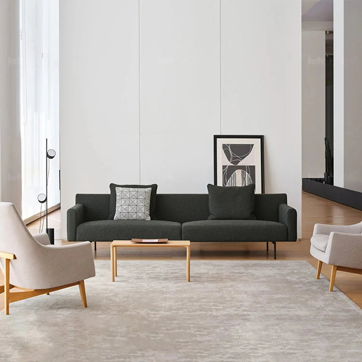 Minimalist fabric 3.5 seater sofa ann in still life.