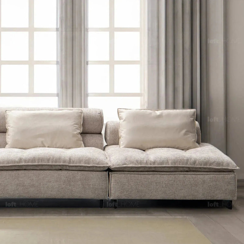 Modern mixed weave fabric 5 seater sofa aumn in close up details.