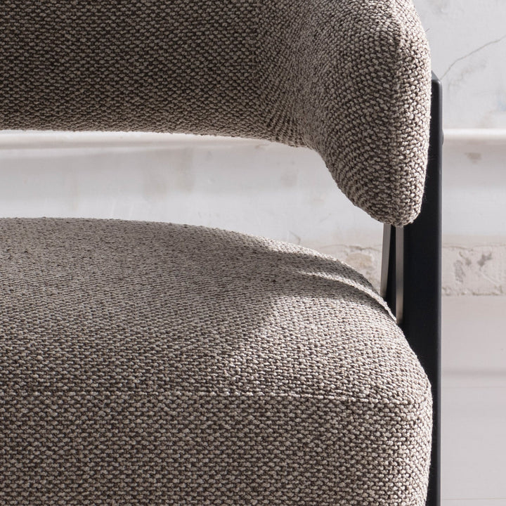 Japandi boucle fabric 1 seater sofa colle in still life.