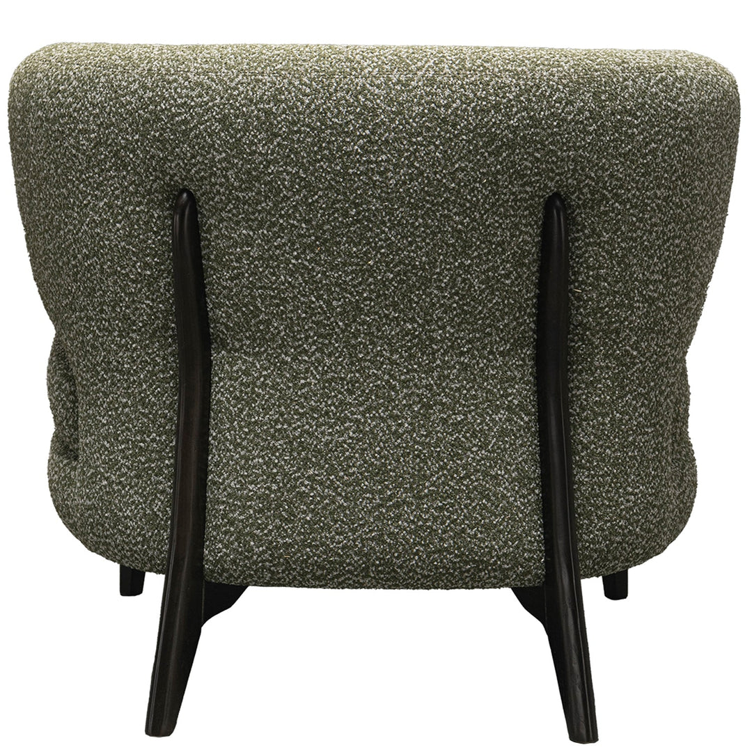 Cream boucle fabric 1 seater sofa moss in still life.
