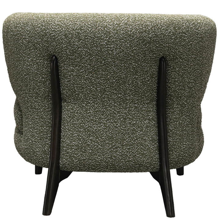 Cream boucle fabric 1 seater sofa moss in still life.