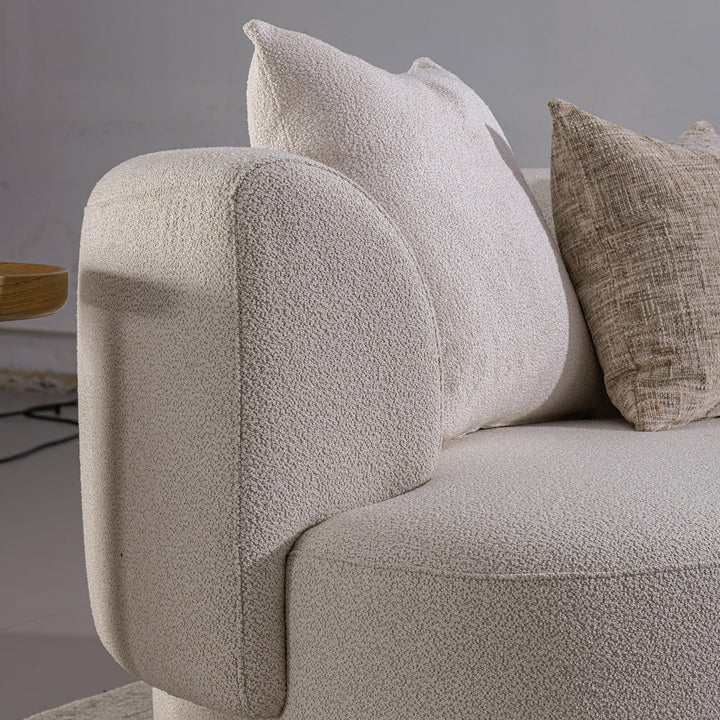 Scandinavian boucle fabric modular 2 seater sofa with side table rene in real life style.