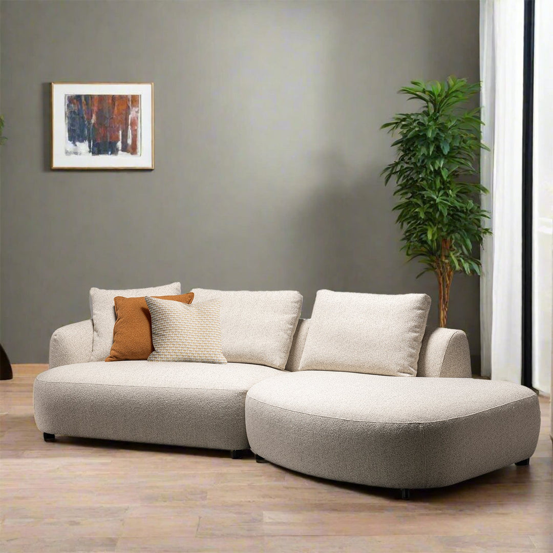Cream boucle fabric modular chaise 2 seater sofa serene environmental situation.