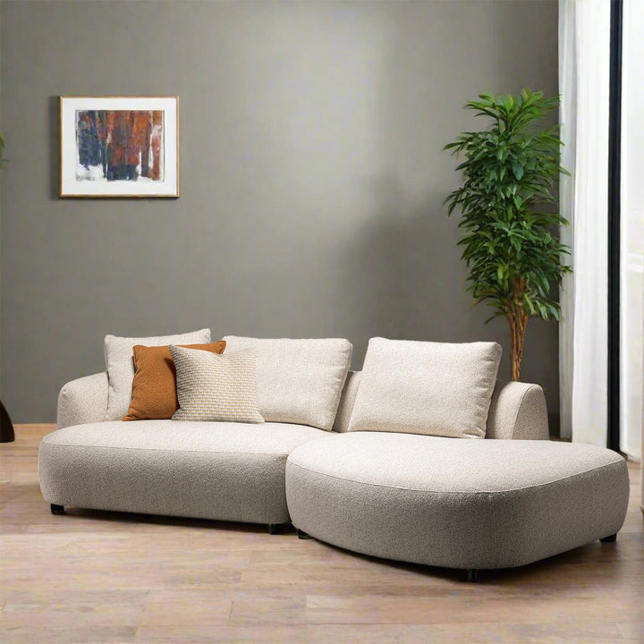 Cream boucle fabric modular chaise 2 seater sofa serene environmental situation.