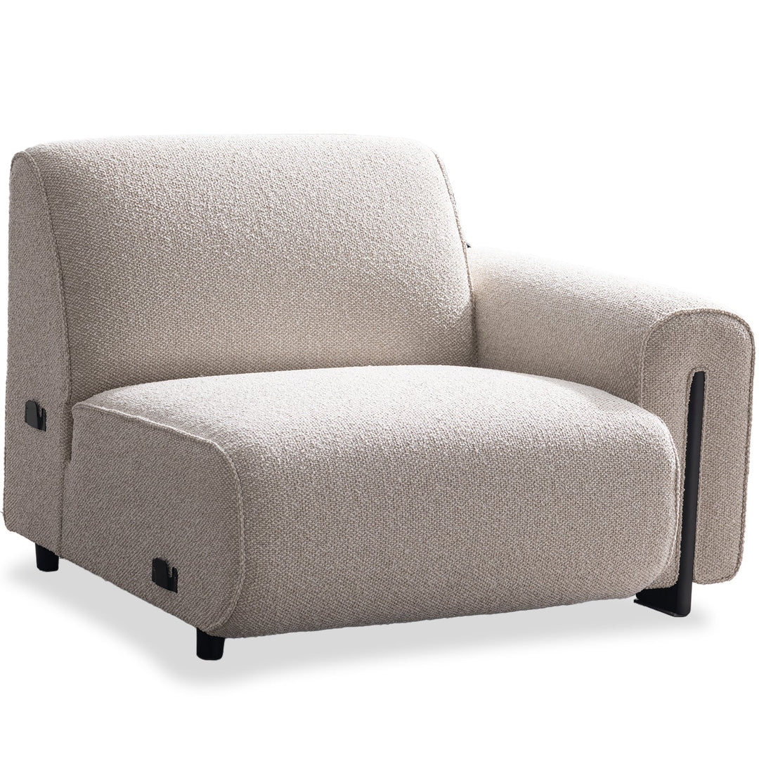 Minimalist boucle fabric modular corner 1 seater sofa colle in white background.