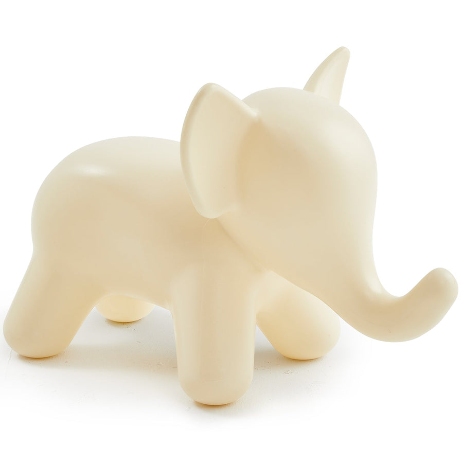Contemporary plastic ottoman elephant in white background.