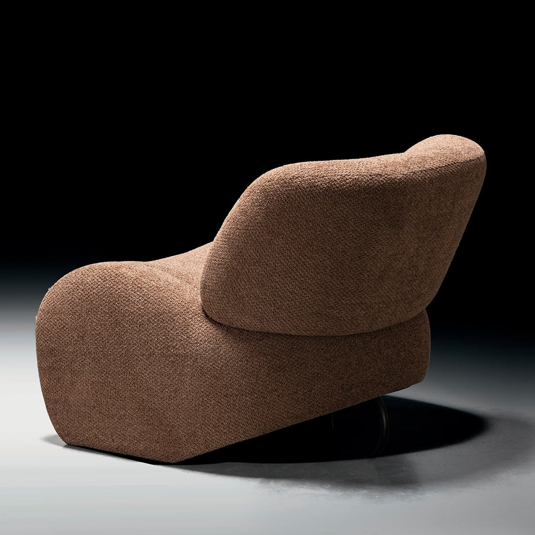 Cream sherpa fabric fabric 1 seater sofa boulder in still life.