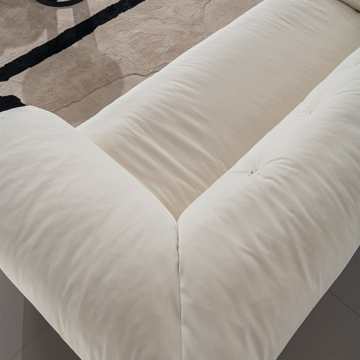 Cream suede fabric 2 seater sofa camellia in panoramic view.