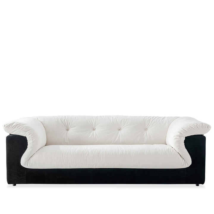 Cream suede fabric 2 seater sofa camellia in white background.