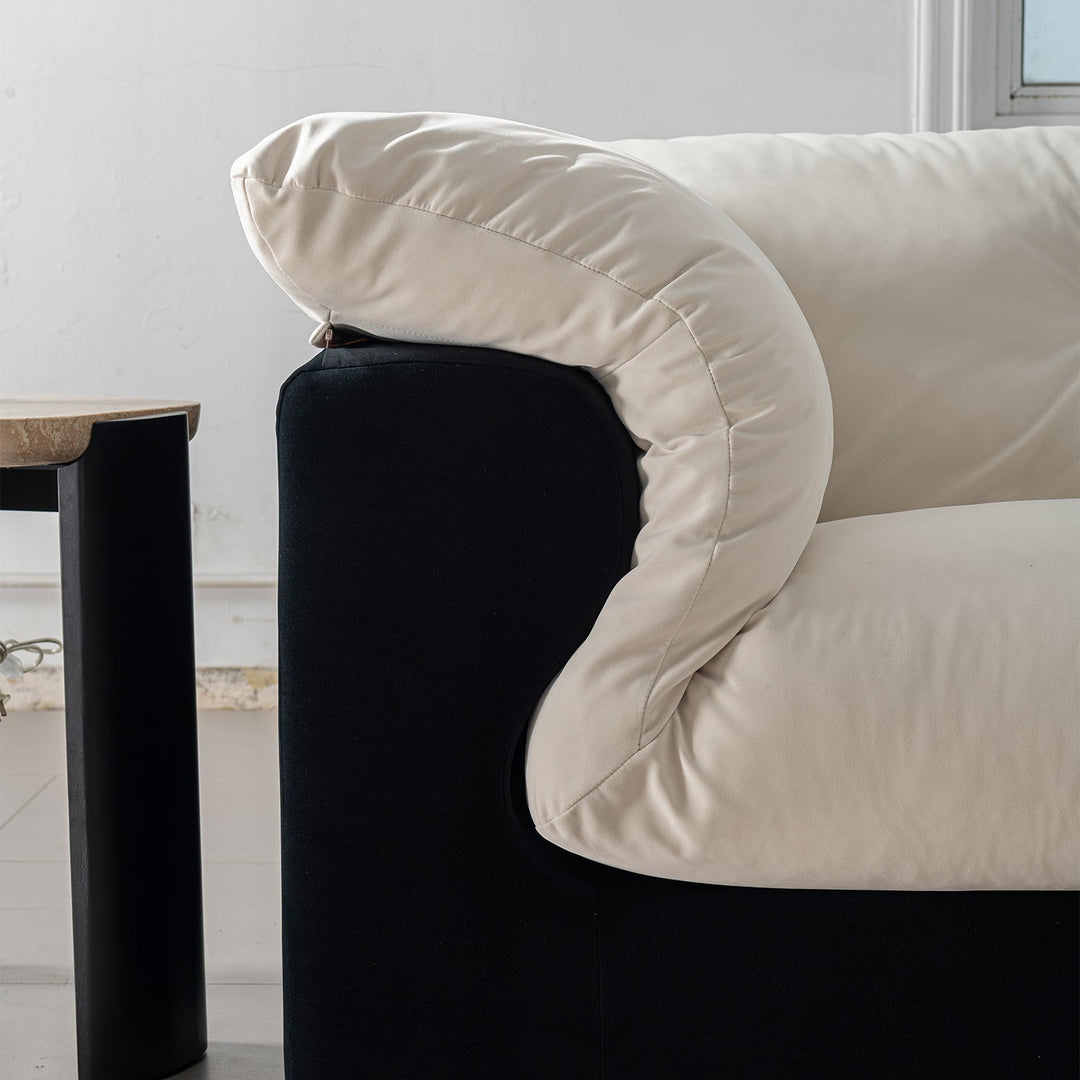 Cream suede fabric 2 seater sofa camellia with context.