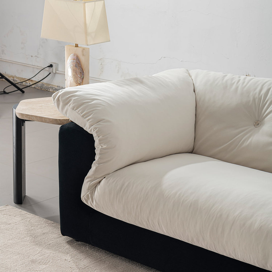 Cream suede fabric 2 seater sofa camellia in close up details.