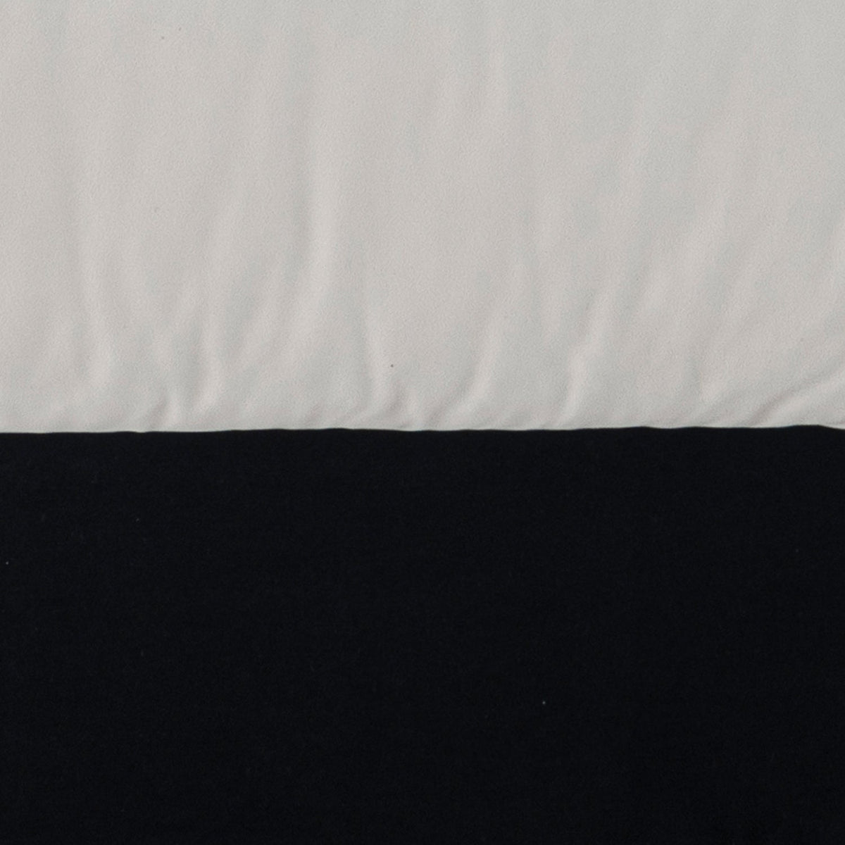 Cream suede fabric armless 1 seater sofa camellia in close up details.