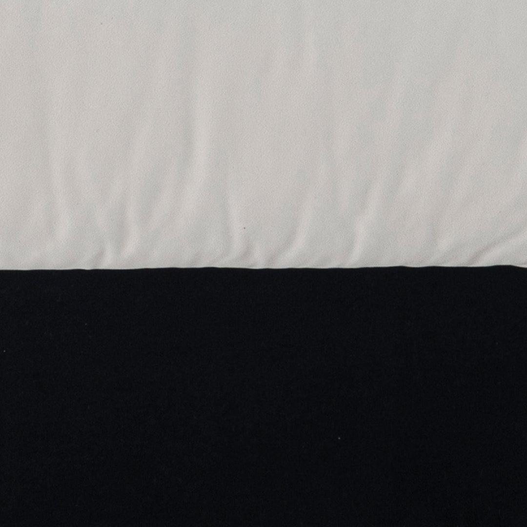Cream suede fabric armless 1 seater sofa camellia in close up details.