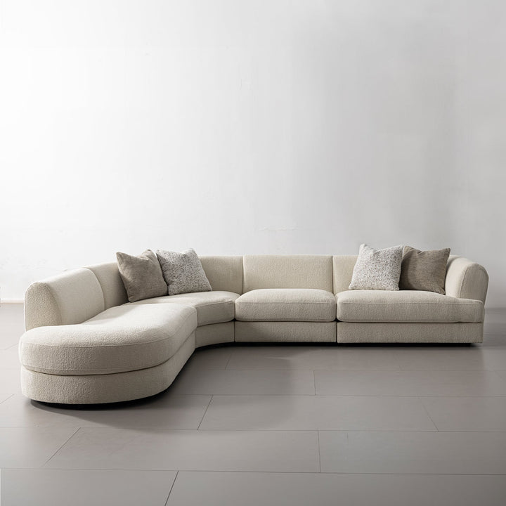 Minimalist velvet fabric modular chaise 2 seater sofa fable in panoramic view.