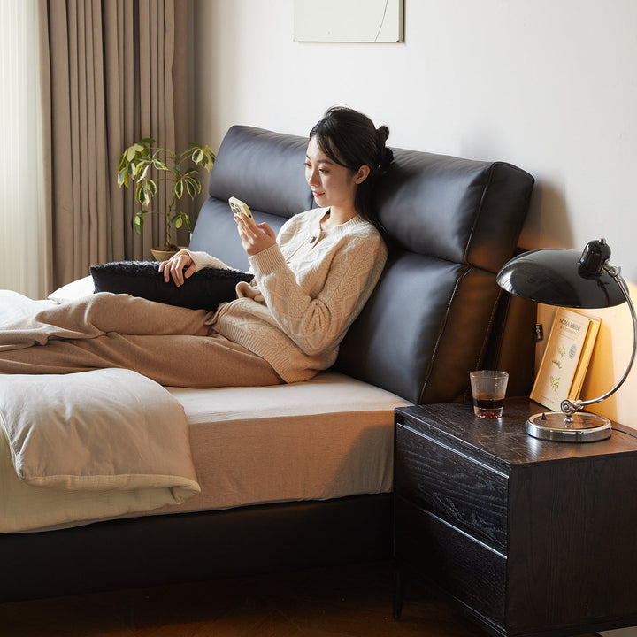 Modern genuine leather bed frame dusko with context.