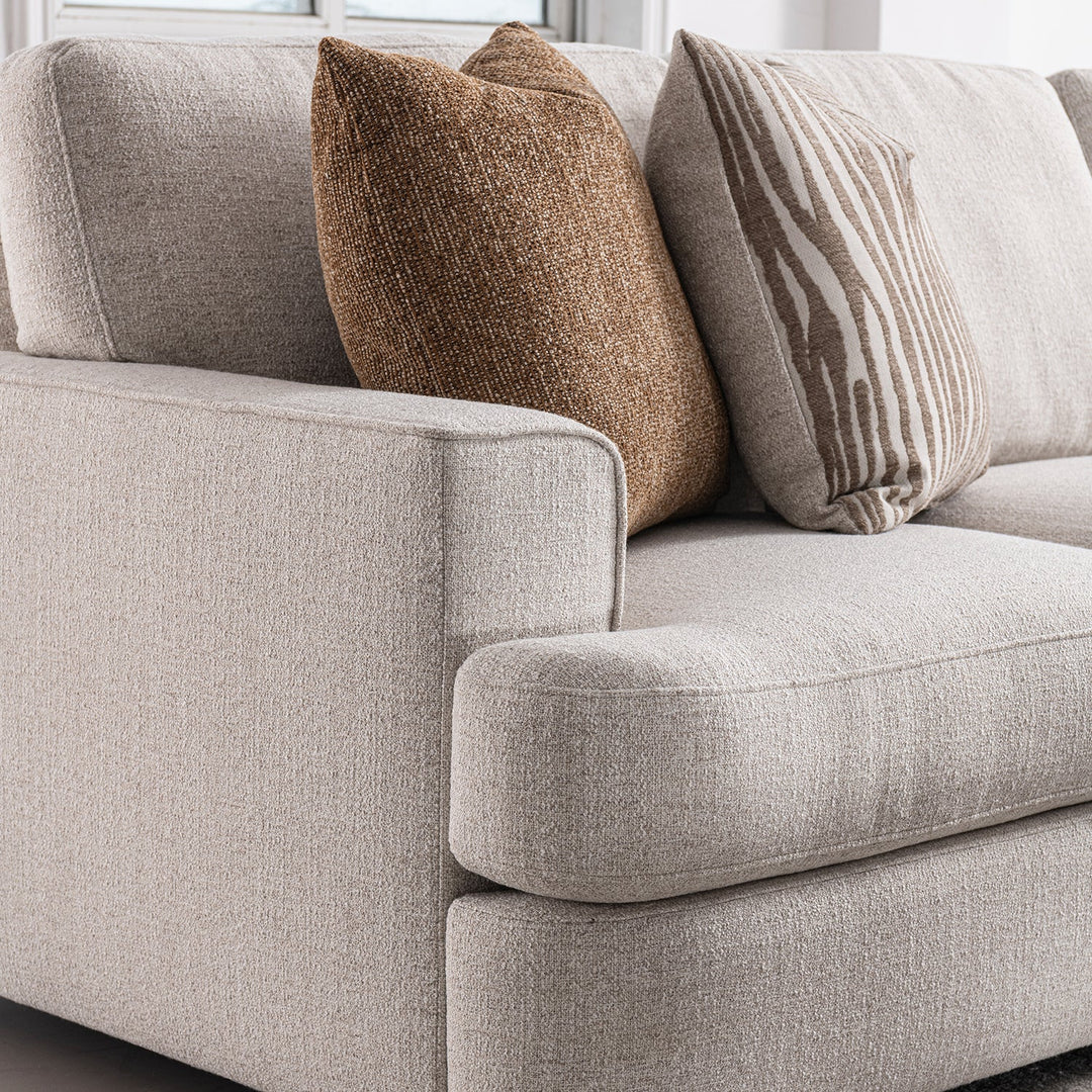 Modern mixed weave fabric corner 2 seater sofa lucent in real life style.