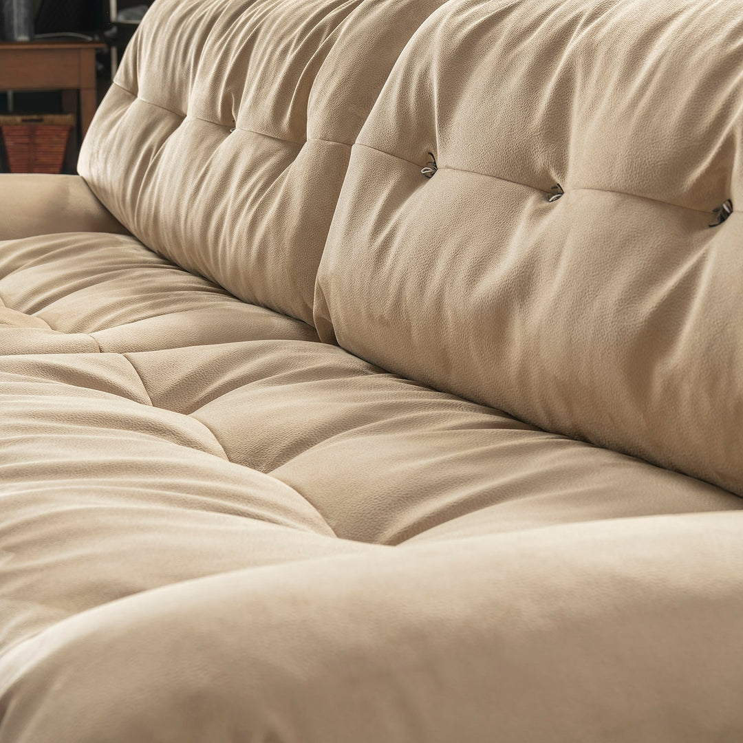 Contemporary suede fabric 4 seater sofa milano in still life.