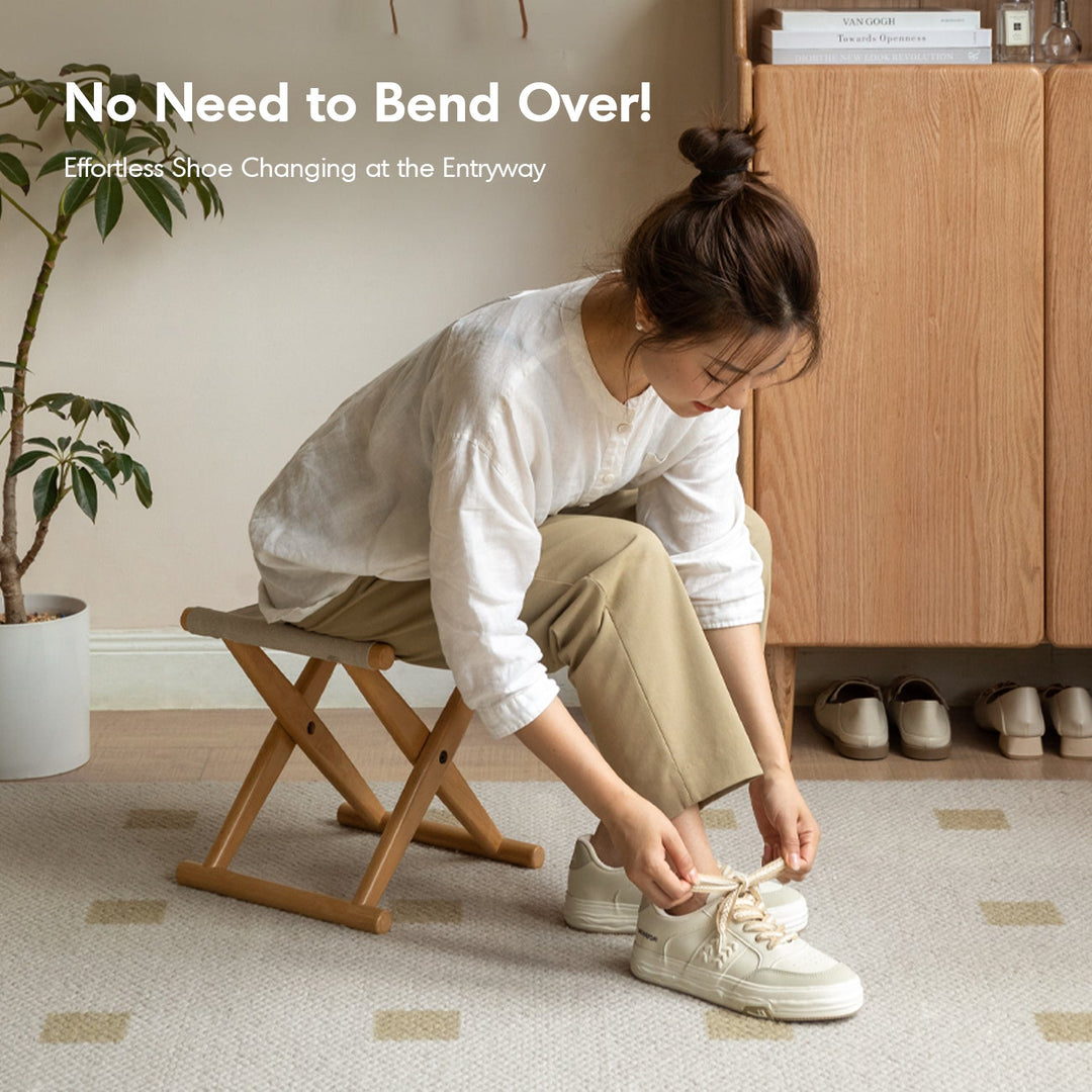 Scandinavian beech wood canvas folding stool kaya layered structure.