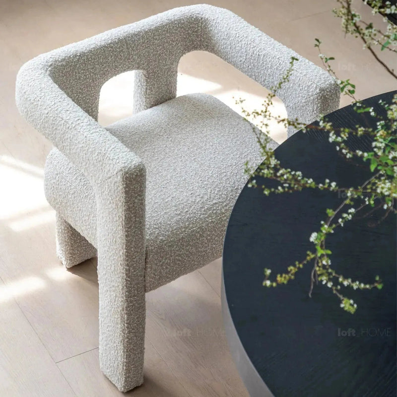 Bauhaus boucle fabric dining chair whim primary product view.