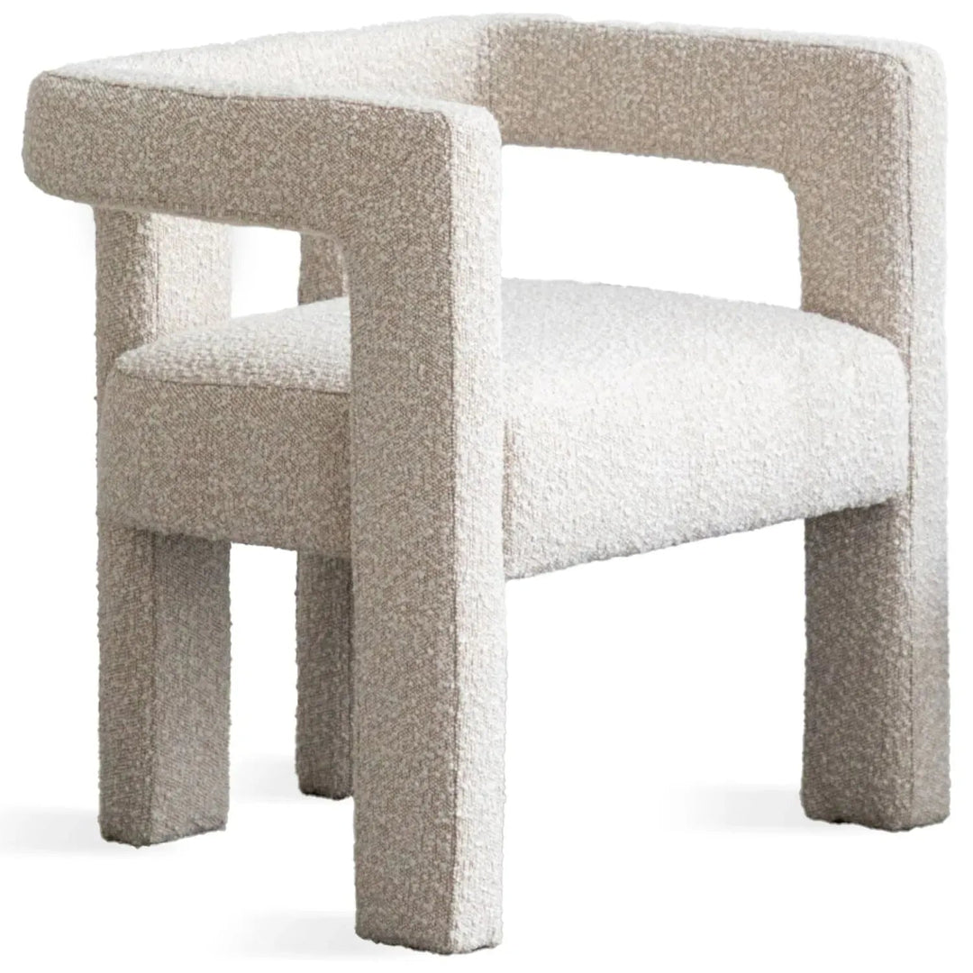 Bauhaus boucle fabric dining chair whim in white background.