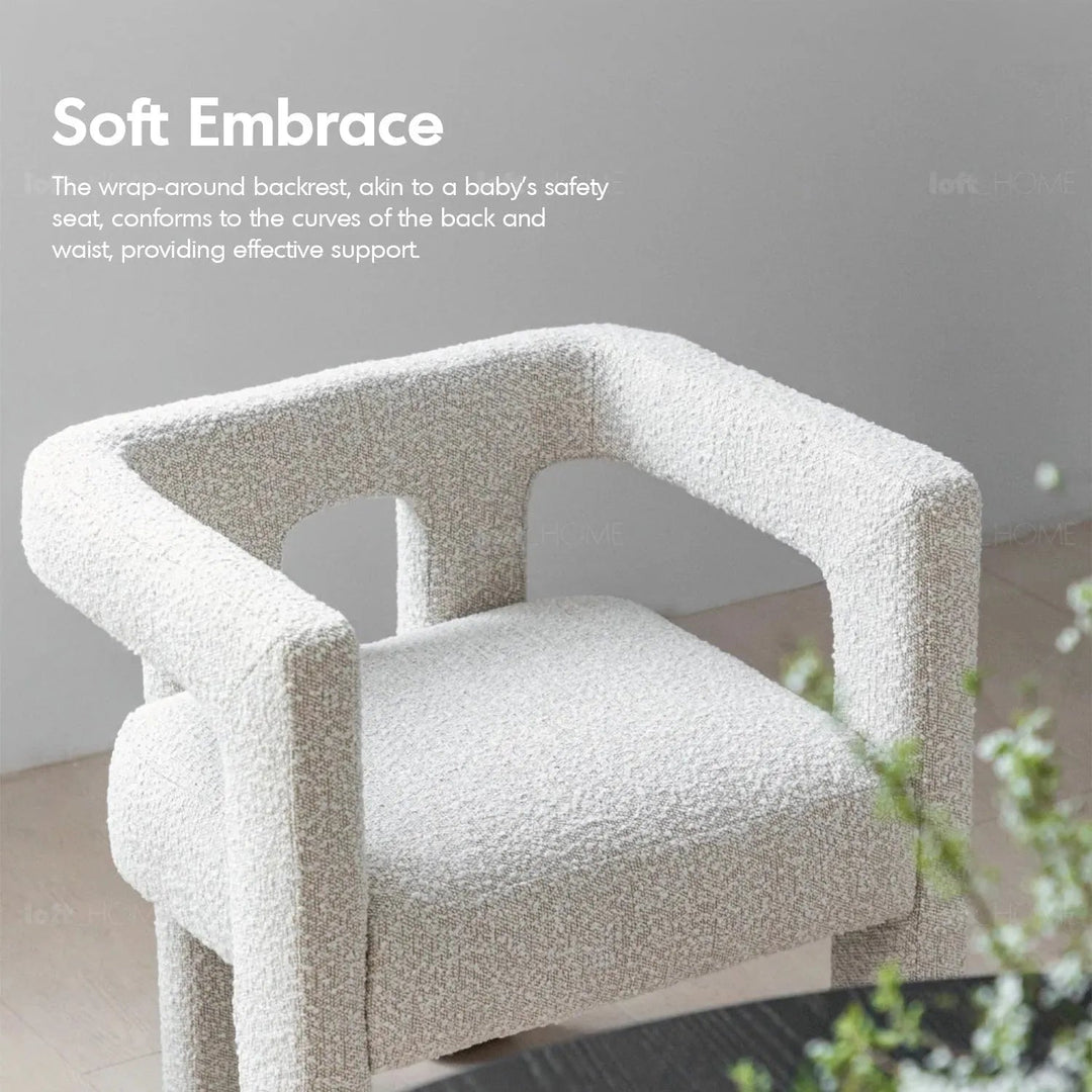 Bauhaus boucle fabric dining chair whim in real life style.