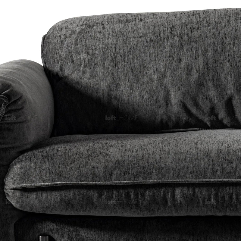 Modern chenille velvet fabric 3 seater sofa dushein in close up details.