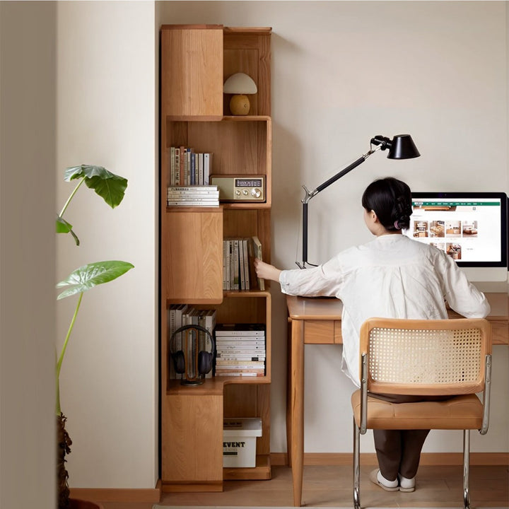 Scandinavian cherry wood corner bookshelf cornera primary product view.