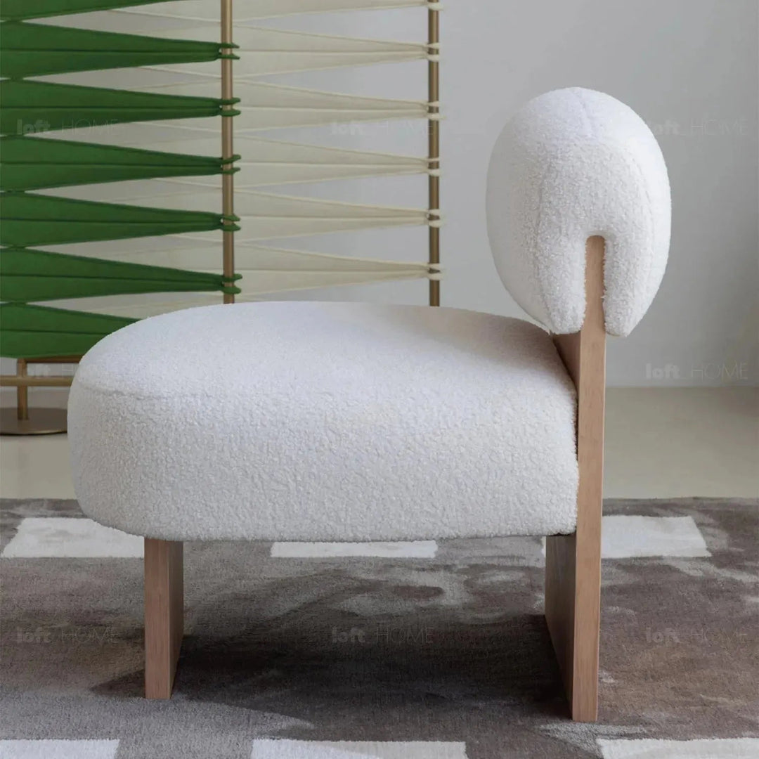 Cream sherpa fabric 1 seater sofa hygge layered structure.