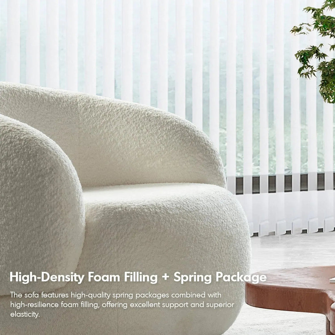Cream fabric 1 seater sofa oslo with context.