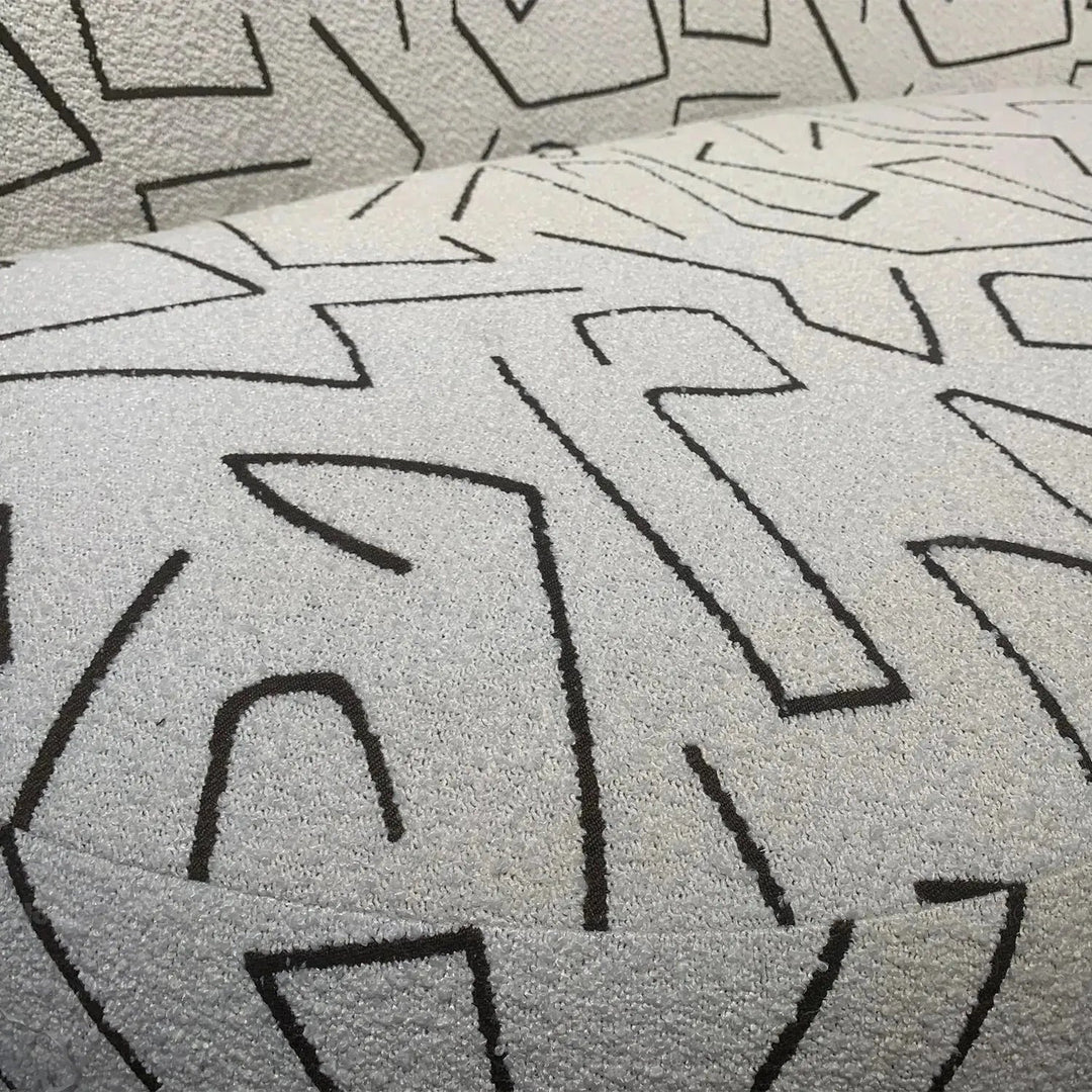Modern fabric 3 seater sofa nostalgia in close up details.