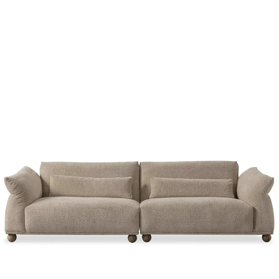 Cream fabric 4 seater sofa fondue in white background.