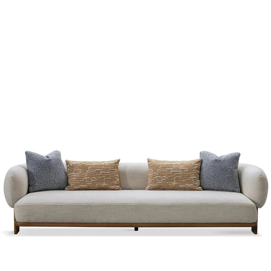 Scandinavian fabric 4 seater sofa waltz in white background.