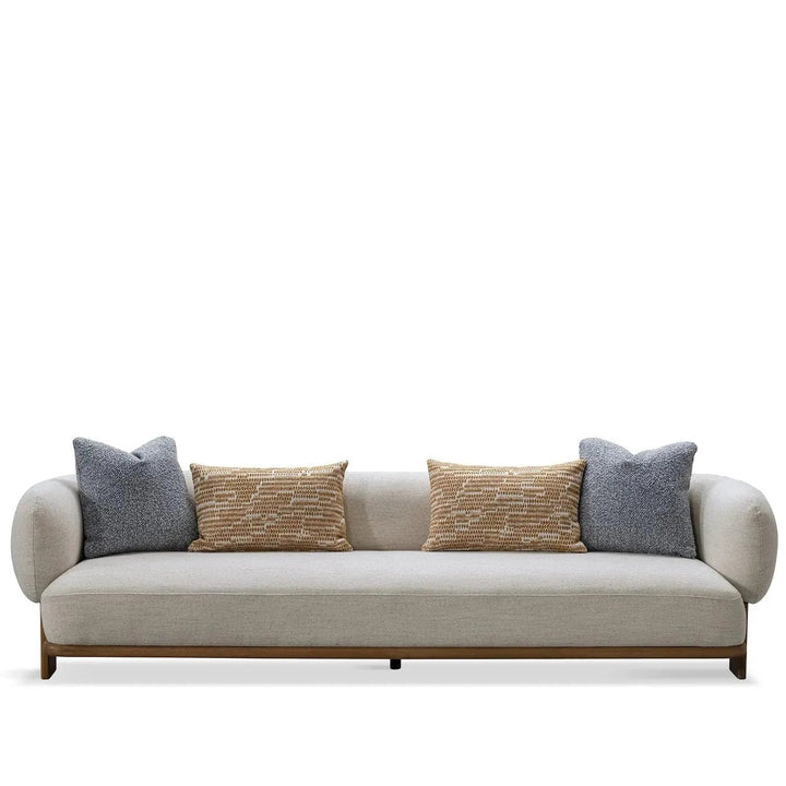 Scandinavian fabric 4 seater sofa waltz in white background.