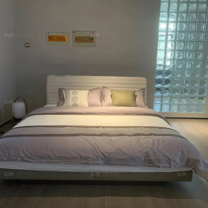Minimalist fabric bed hoverloft in still life.