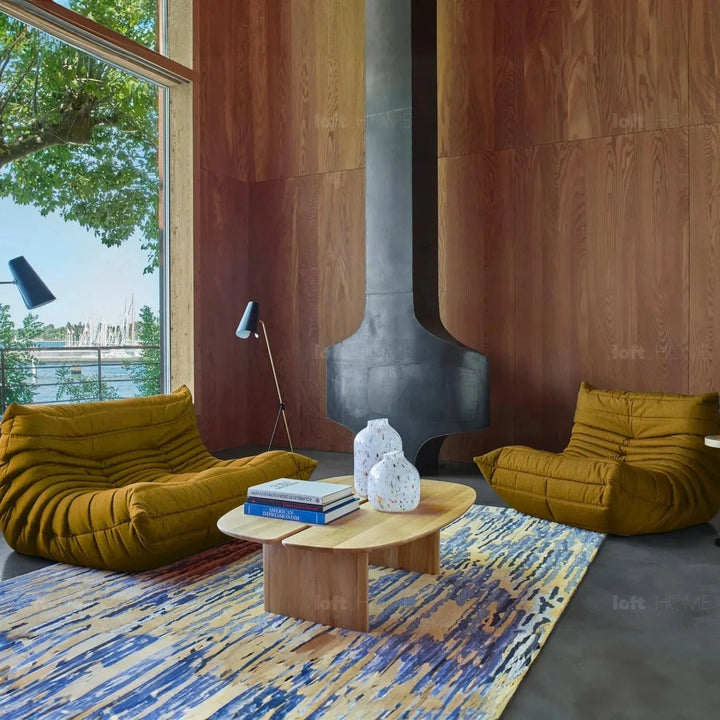 Contemporary fabric modular 3 seater sofa cater in still life.