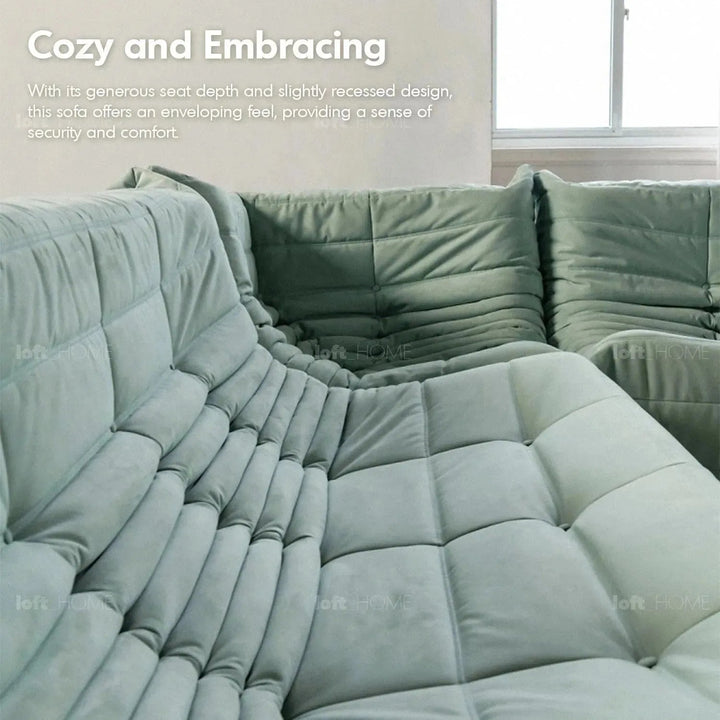 Contemporary fabric modular 3 seater sofa cater in close up details.