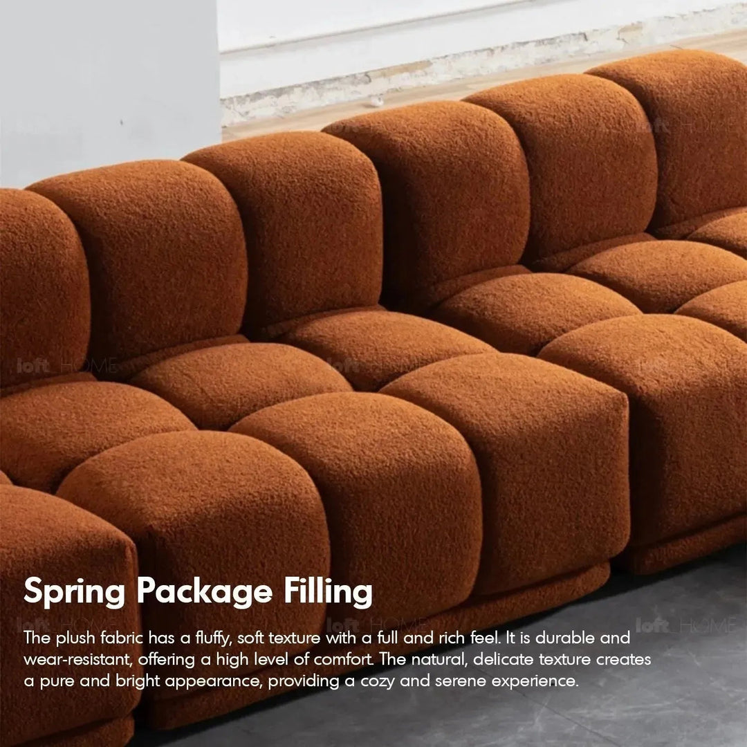 Contemporary teddy fabric modular 4 seater sofa cuboid in close up details.