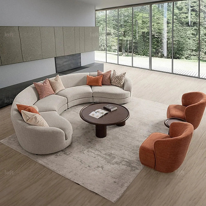 Cream fabric modular 5 seater sofa groove in panoramic view.